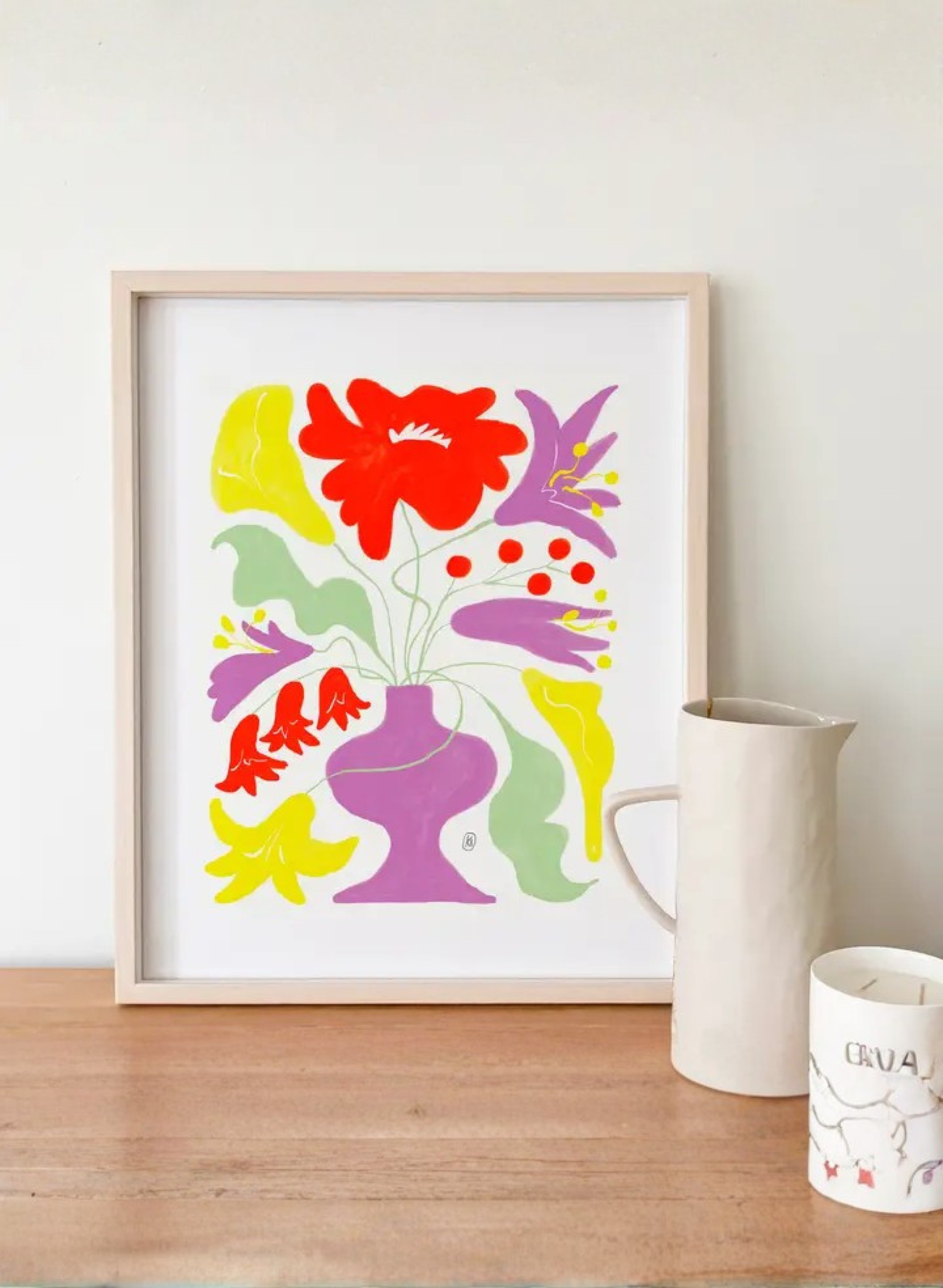 Lilac Vase Art Print by Karen Schipper featuring a purple vase filled with red, yellow, lilac, and soft green botanical artwork.