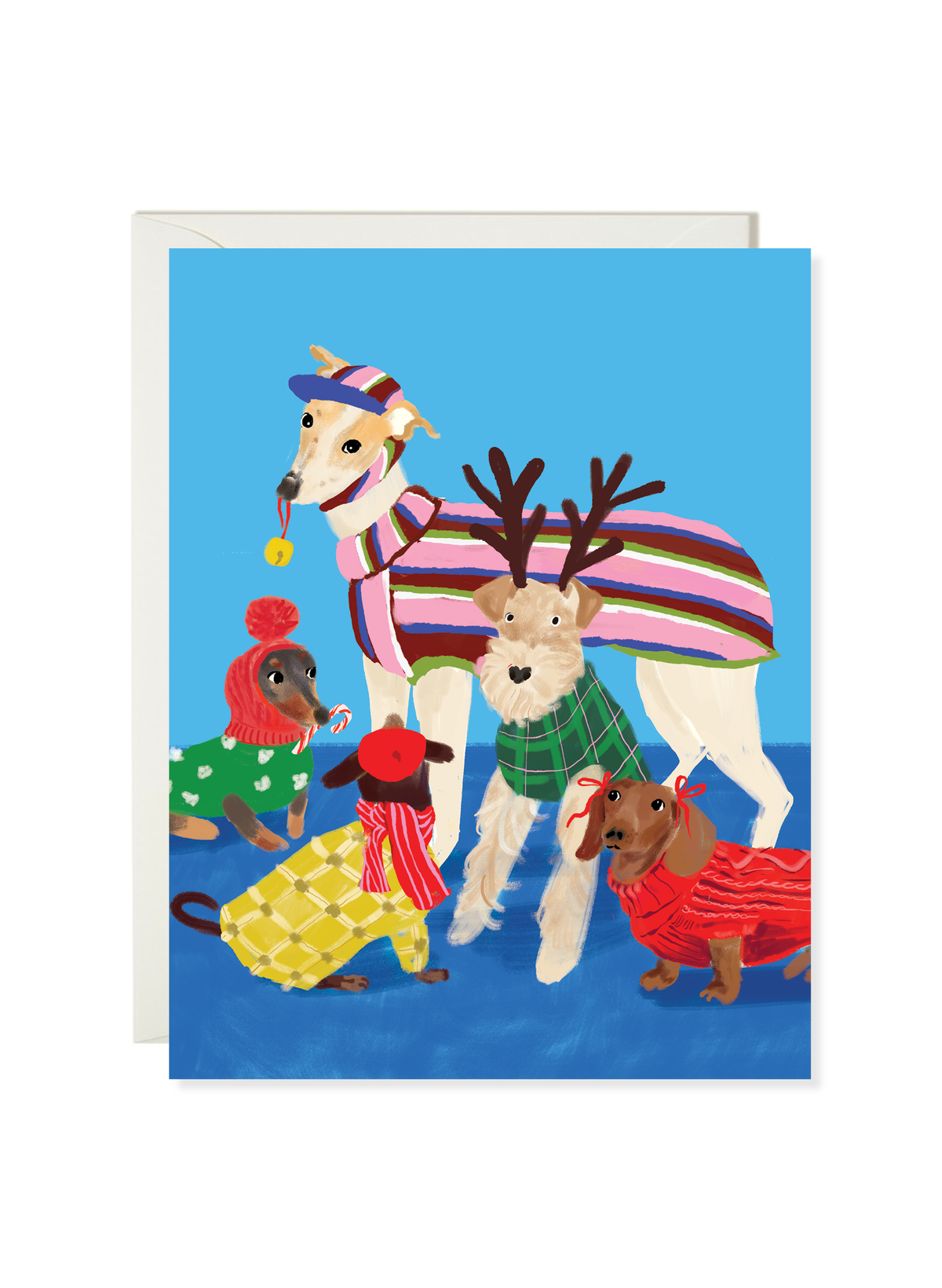 Christmas Dogs card by Karen Schipper featuring three festive dogs in colorful holiday outfits on a bright blue background.