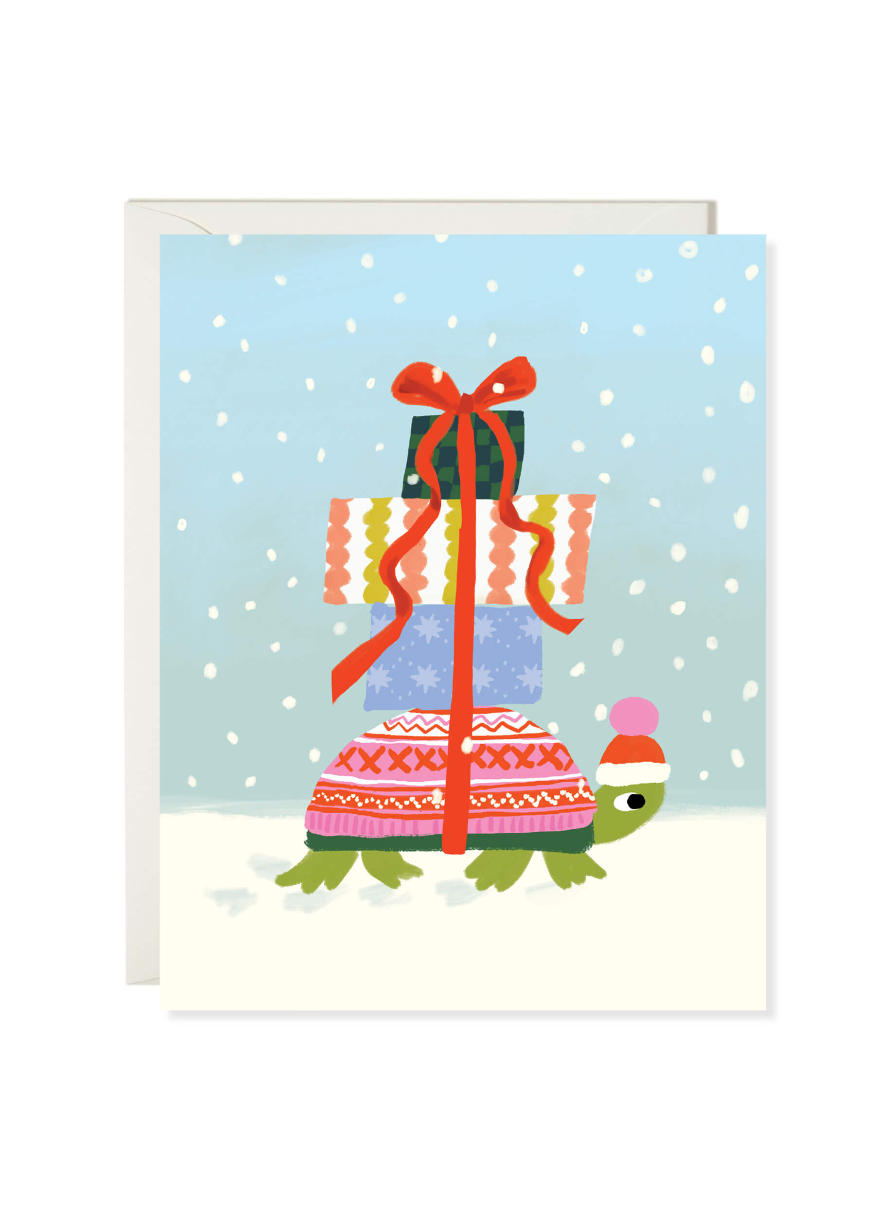 Winter Turtle card by Karen Schipper featuring a green turtle in a winter hat and cozy sweater carrying stacked Christmas gifts in the snow.