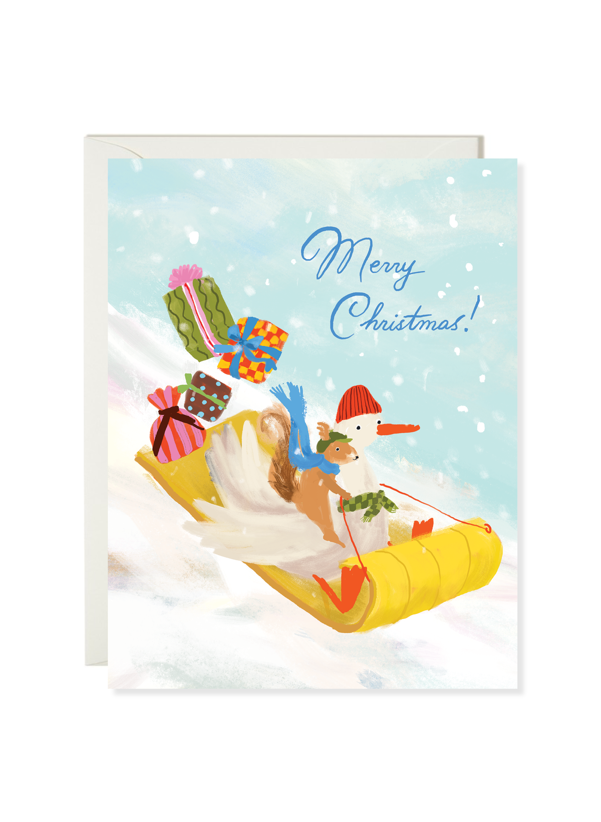 Tobaggan card by Karen Schipper featuring a snowy sledding scene with stacked gifts, a bright yellow toboggan, and a Merry Christmas message.