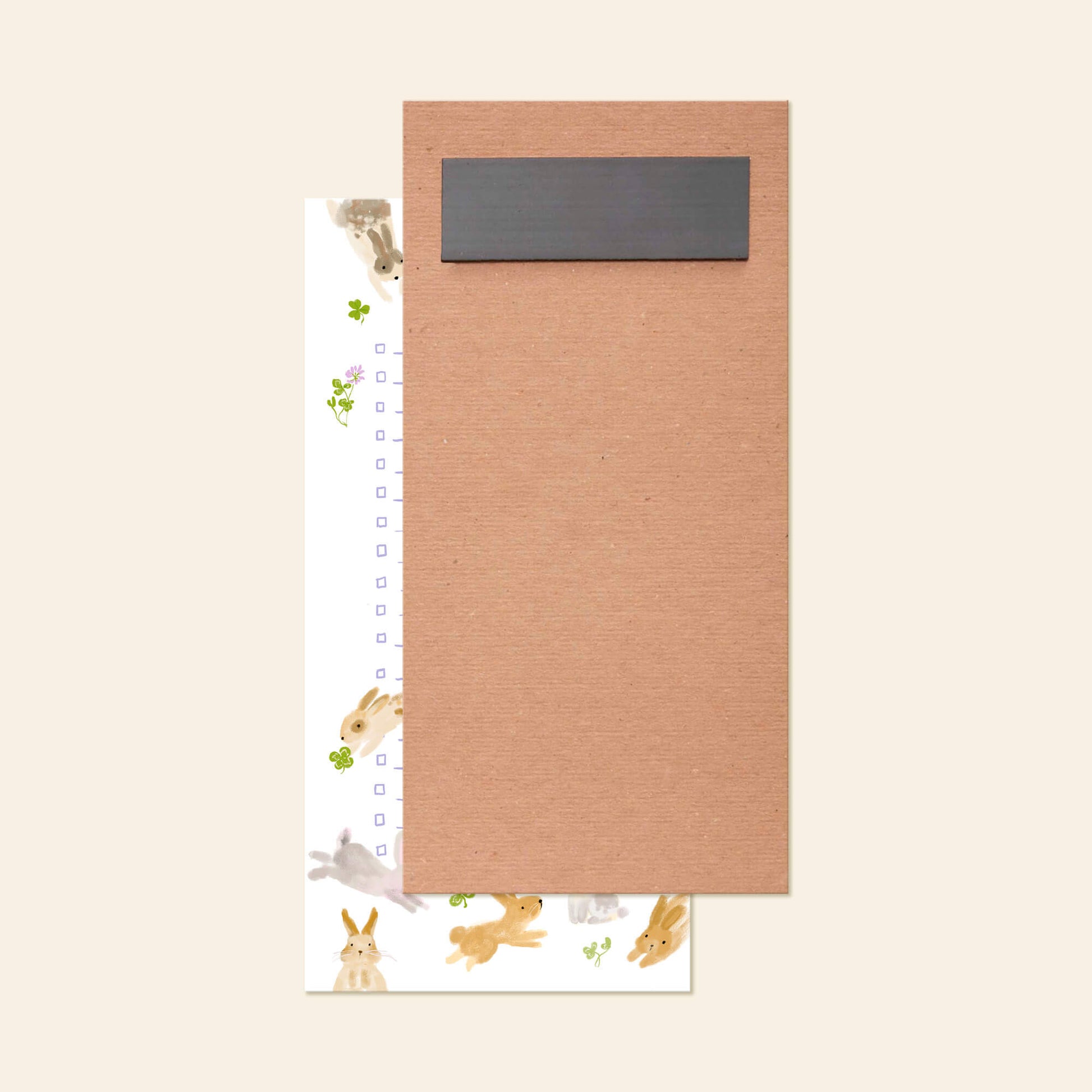 Hop to It Bunny List Pad by Karen Schipper with illustrated bunnies, floral details, and a magnetic backing, great for grocery lists and reminders for gardeners and cute stationery lovers