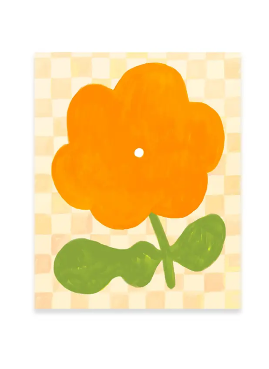 Marigold Bloom Art Print by Karen Schipper featuring a bold orange flower with green leaves on a soft cream checkerboard background.